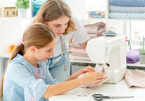 Premium Photo | Tailor is teaching student