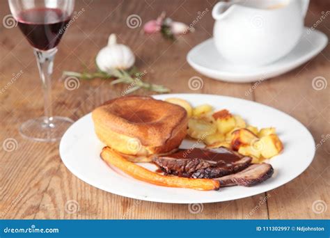 Roast Beef with Yorkshire Pudding Stock Image - Image of roast, rustic ...