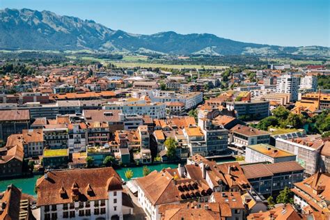 Thun Cityscape With Alps Mountain And Lake In Switzerland Stock Photo