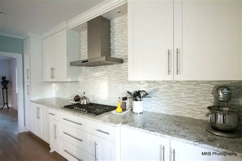 Cool White Kitchen With Bianco Romano Granite