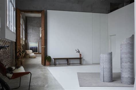 Rotunnojustman Combines Naked Concrete Details With Brick To Form Sleek Interiors For Photo Studio