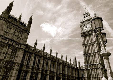 The Big Ben Clock Tower Towering Over The City Of London In Sepia Tone