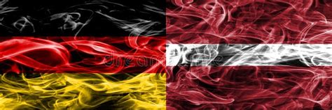 Germany Vs Latvia Smoke Flags Placed Side By Side German And La Stock