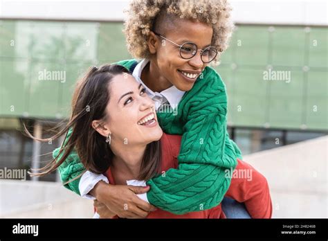 Happy Multiracial Female Friends Having Fun Together Outdoor Together Focus On African Girl