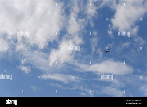 Passenger Plane On Air Flying Away Stock Photo Alamy