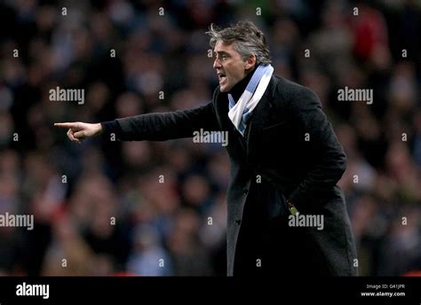 Manchester City Manager Roberto Mancini On The Touchline Stock Photo