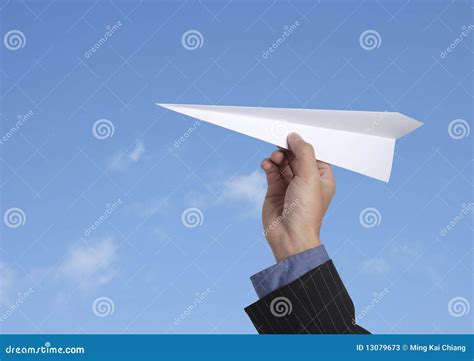 Throwing a paper plane stock image. Image of airplane - 13079673