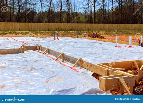 Immediately Prior To Pouring Of Foundation Ground Is Covered With