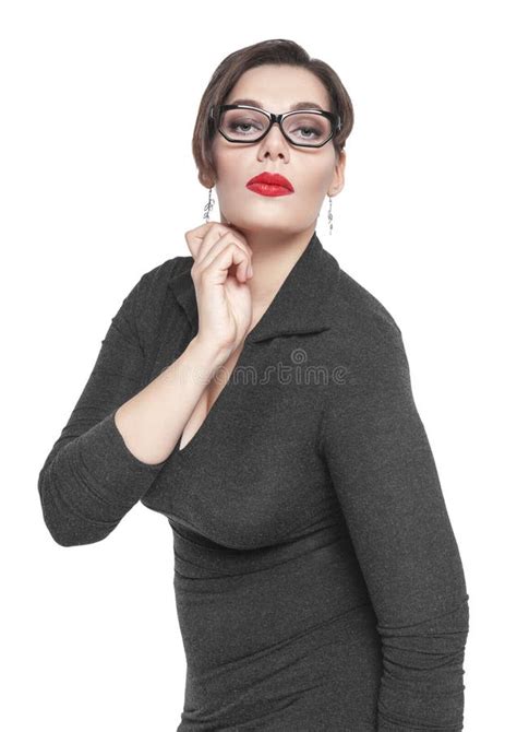 Beautiful Plus Size Woman In Black Dress And Glasses Posing Stock Image