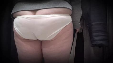 In A Fitting Room In A Public Store The Camera Caught A Chubby MILF With A Gorgeous Ass In