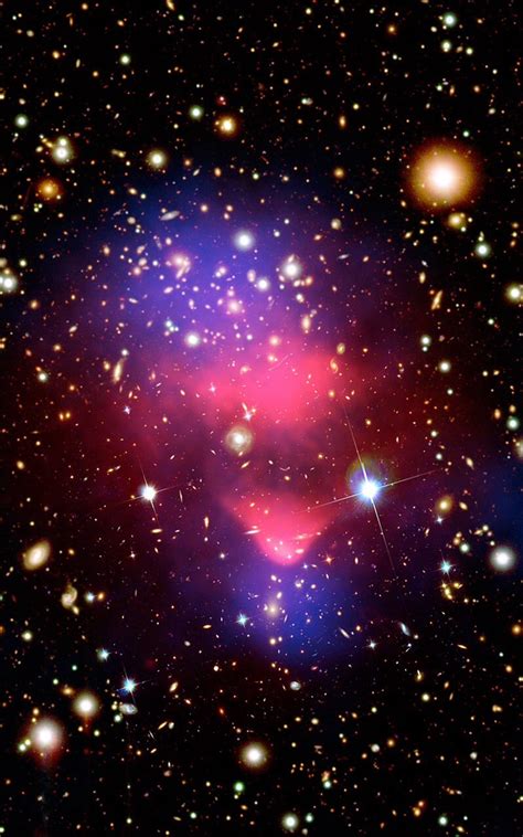 Billions and Billions - IE 0657-556 Bullet Cluster This composite image...