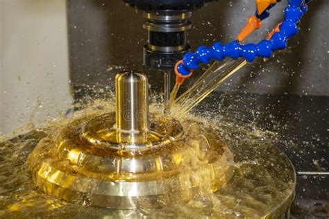 The Cnc Milling Machine Cutting The Shell Mold Parts With Oil Coolant