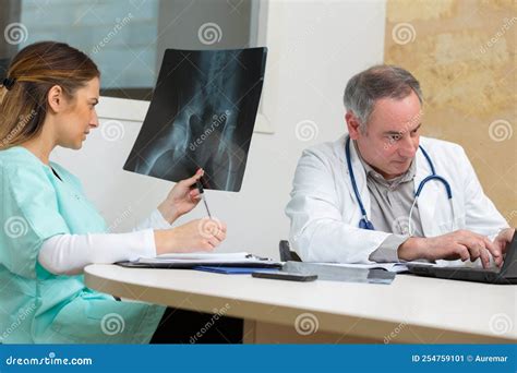 Portrait Practitioner Examining Pelvic Xray Stock Image Image Of Science Vertebra 254759101