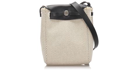 Hermès Sac bandoulière Hermes en toile blanche Herbag TPM Cuir Veau