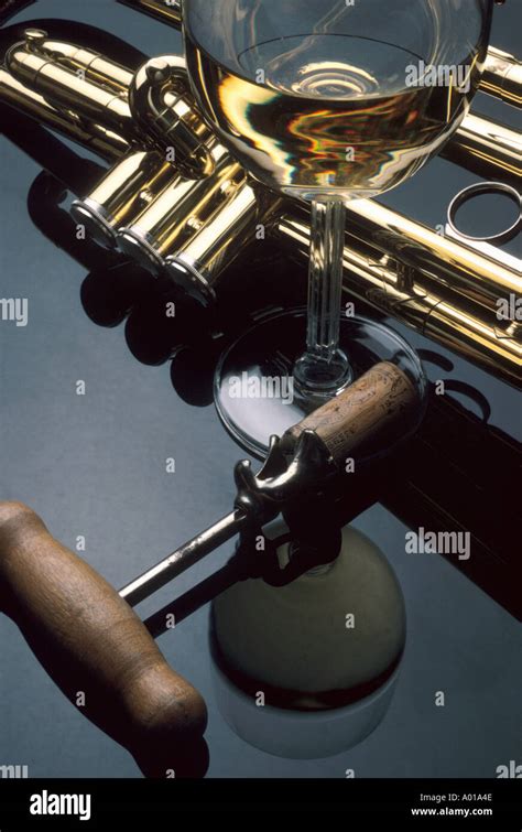 Trumpet With Wine Glass And Cork Screw Stock Photo Alamy