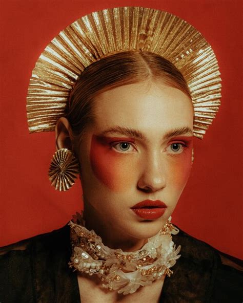 Premium Photo Close Up Of Woman With Face Paint Wearing Jewelry