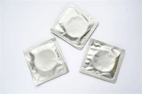 Black Condoms On White Stock Photos Royalty Free Black Condoms On