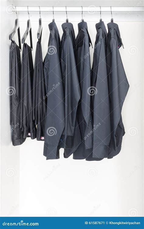 Black Clothes Hanging on Rail Stock Image - Image of wardrobe, blank: 61587671