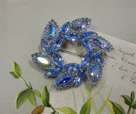 Weiss Signed Blue Rhinestone Pin Wheel Crystal Brooch Gem