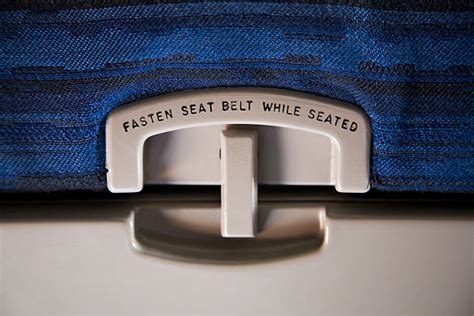 Best Fasten Seat Belt Sign Stock Photos, Pictures & Royalty-Free Images ...