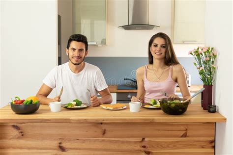 Young Beautiful Couple Eating Healthy Organic Food for Breakfast Stock Image - Image of greenery ...