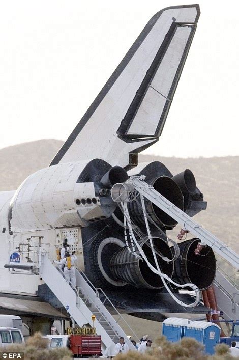 Amazing Pictures Space Shuttle Discovery Soars Through The Clouds