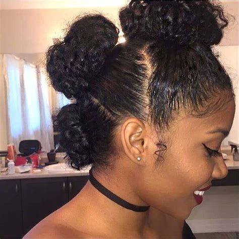 20 Amazing Curly Bun Hairstyles To Stand Out 2024 Trends