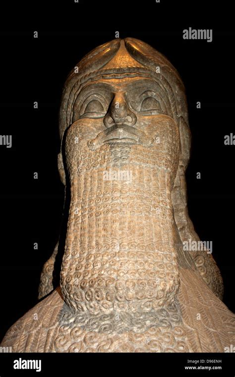 Winged Human Headed Bull Statue Known As A Lamassu Or Protective