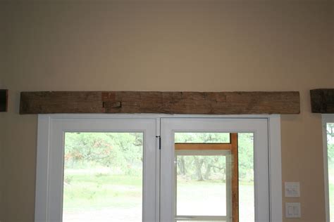 Headers Over Doors And Windows Using Reclaimed Hand Hewn Beams