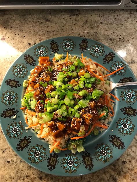 Sweet And Spicy Sriracha Tofu Cauliflower Rice With Carrots Broccoli And Edamame Very Tasty