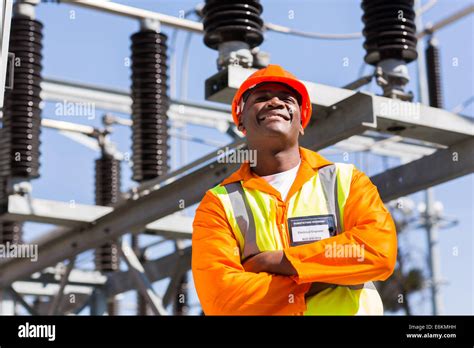 African Electrical Engineer With Arms Crossed In Electricity Power