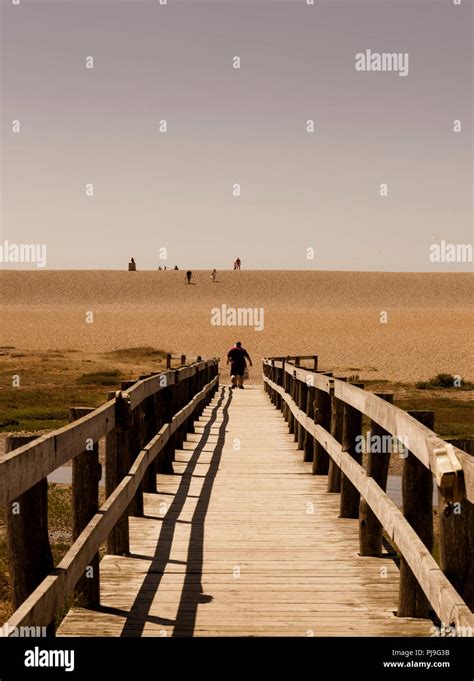 Footbridge Leading To Chesil Beach An 18 Mile Long Pebble And Shingle