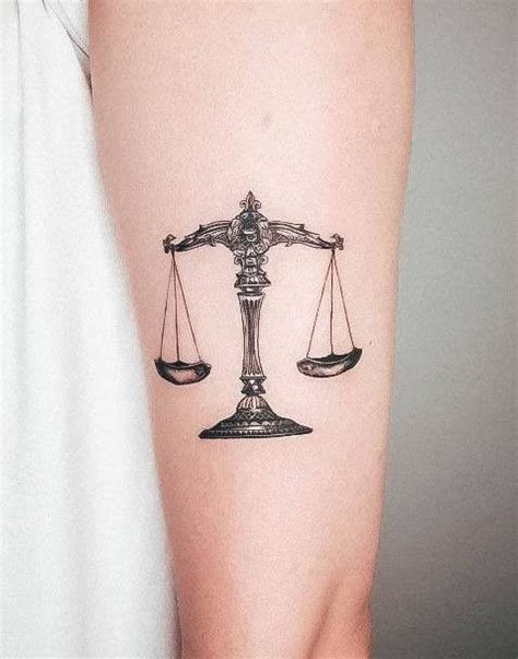 Lady Justice Scale Tattoo on Arm