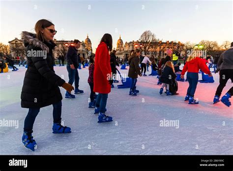 England, London, Greenwich, Adults and Children Ice Skating at The ...