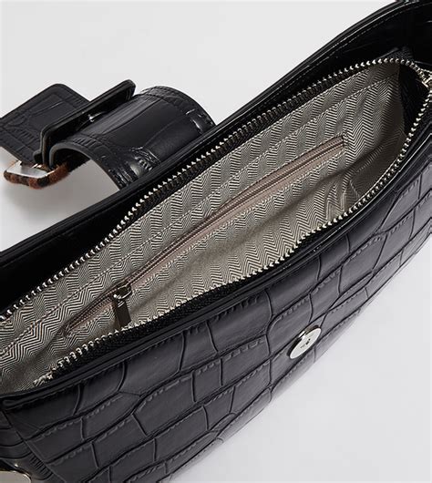 Buy Tyra Textured Saddle Sling Bag In Black 6thStreet UAE