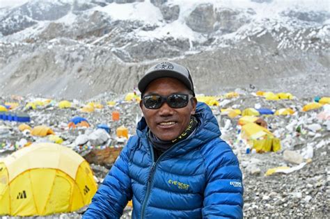 Sherpa breaks record with 27th Mount Everest summit