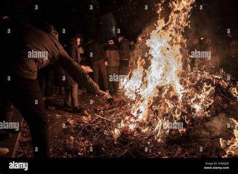 People Burning Badnjak On Orthodox Christmas Night In Belgrade Serbia