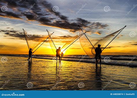 Fishermen Fishing In The Sea At Sunrise Stock Photo Image Of Holy