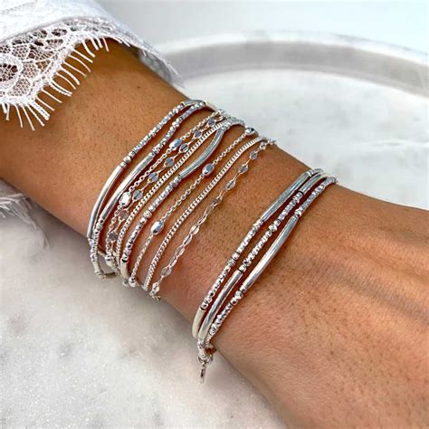 BRACELET TRIPLE ÉLASTIQUES TUBES LISSES ET DIAMANTES BRACELETS ARGENT