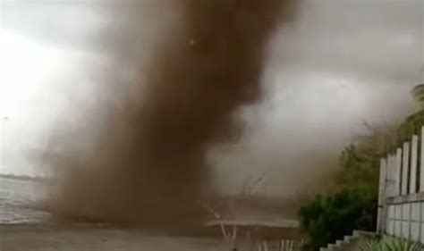 Terrifying Moment Mosquito Tornado Sweeps Through Village Creating