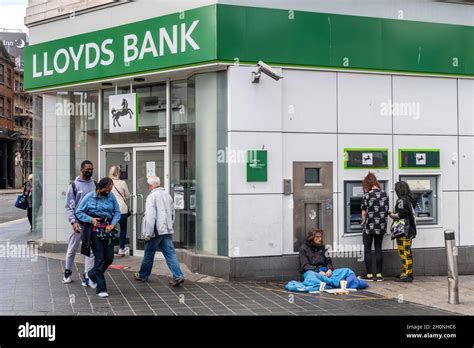 Homeless man begging outside Lloyds Bank, Church Street, Liverpool ...