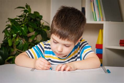 Preschool Child Learns To Write Writes Copybook Stock Photo Image