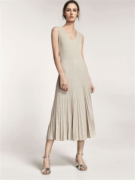 Spring Summer Womens Knit Dress With Pleated Detail On Hem At