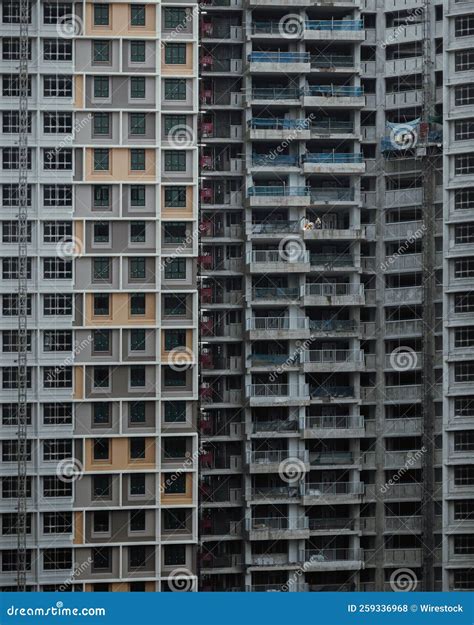 Two High-rise Clean Modern and Old Dirty Apartment Buildings Next To