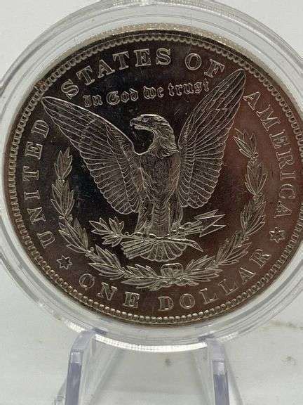 1885 silver dollar - Gary Realty & Auction