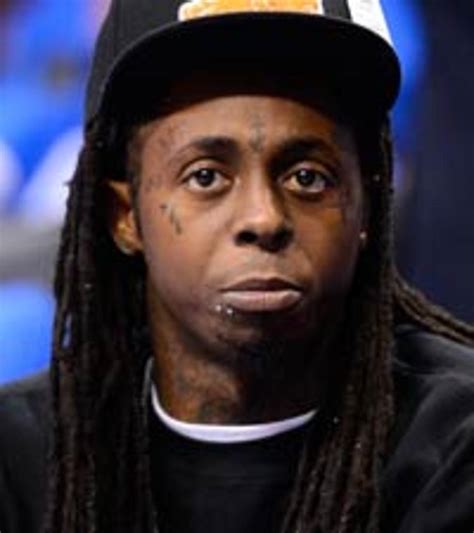 Lil Wayne Tattoos Forehead, Chris Brown & Rihanna Cuddle, J. Cole ...
