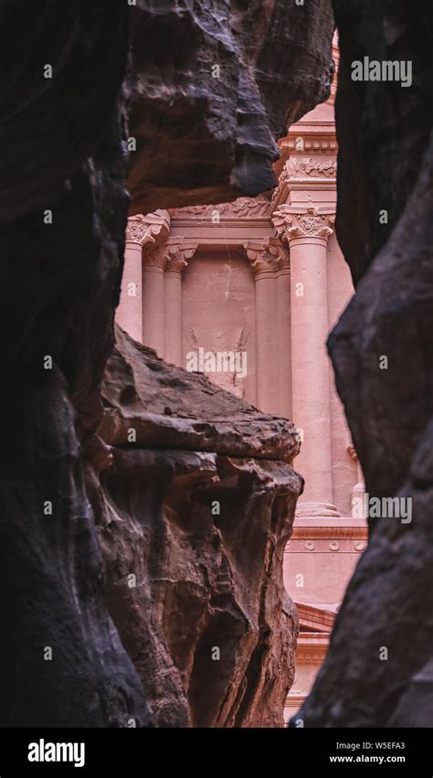 A Peak Through The Rocks As You Walk Toward The Treasury At Petra