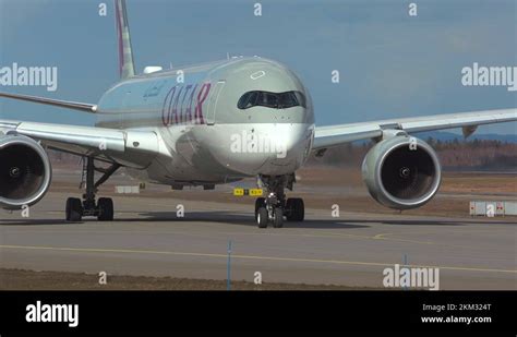 airplane airbus a350 taxiing front side view turning pilot in cockpit ...