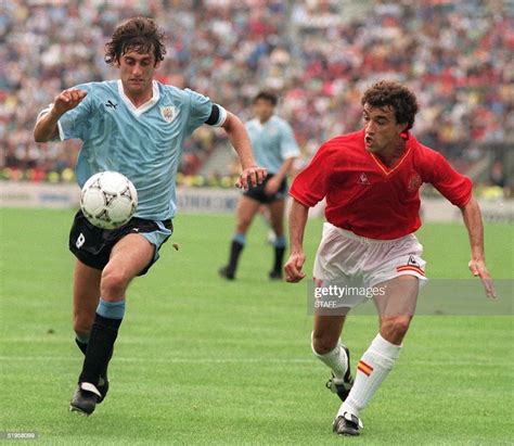 Uruguayan captain and midfielder Enzo Francescoli eyes the ball as he ...