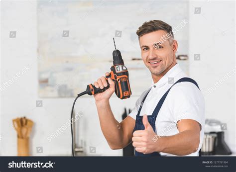 237 Man Holding Drill Thumbs Up Stock Photos Images And Photography
